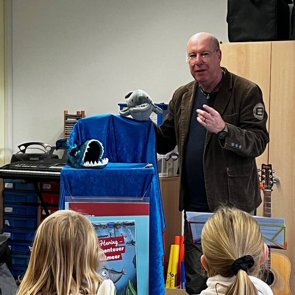 Kinderbuchautor Guido Kasmann zu Gast in Rheinberg: Lesung, Theater und Konzert in der Millinger Grundschule