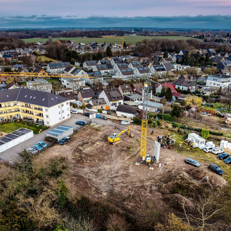 Spatenstich in Langenfeld: Im Gartenland von Reusrath entstehen vier Mehrfamilienhäuser