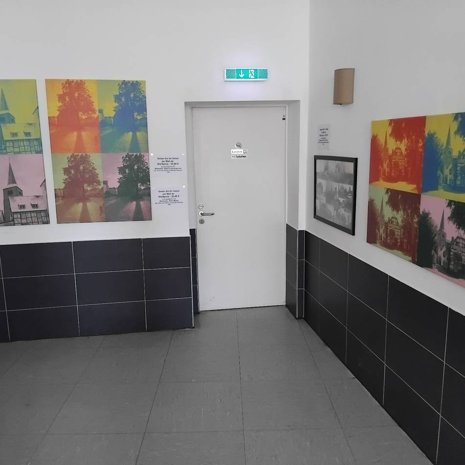 Aktion in Hilden: Bilderversteigerung im Café K für guten Zweck