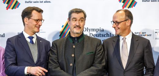 Markus Söder und Hendrik Wüst rangeln um Olympia