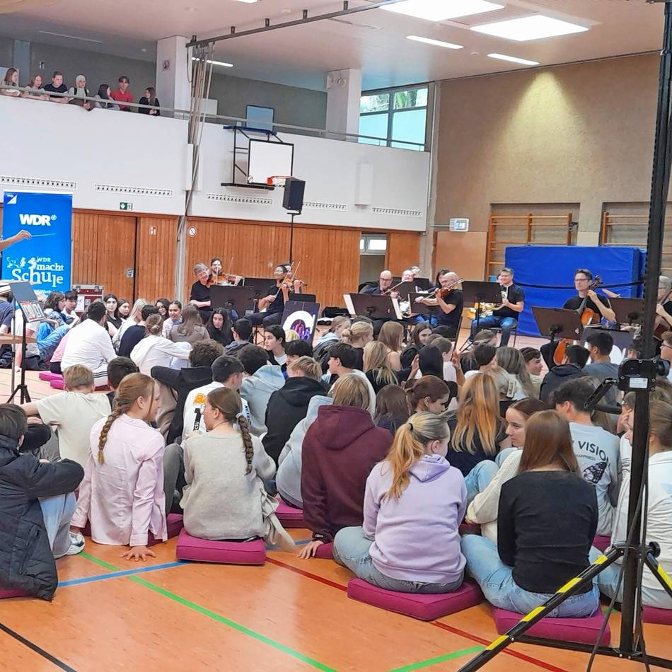 Music Battle des WDR im Gymnasium: Wülfrather Schüler dirigiert Sinfonieorchester